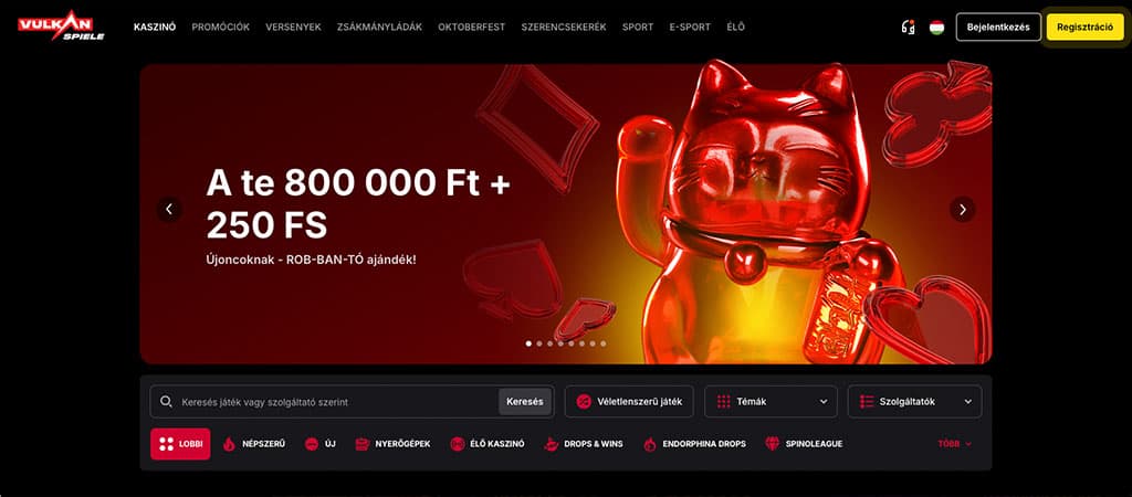 A Vulkan Spiele casino főoldala, ahol egy nagy piros szerencsemacska és egy bónusz ajánlat látható.